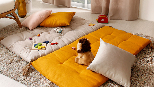 Le futon repliable Panama avec pompons jute